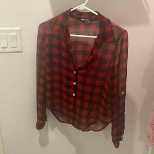 Button up flannel long sleeve shirt.